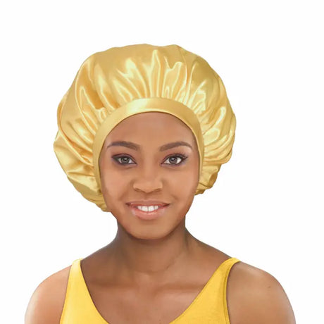 bonnet en satin qui protège les cheveux des frottements sur l'oreiller et prévient la casse il maintient votre coiffure intacte jusqu’au lendemain.