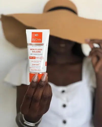 ecran solaire peau noire Mon Fluide Solaire SUN'OYA® - Laboratoire IN'OYA Crème solaire SPF 50 dédiée aux peaux noires, mates et métisses.